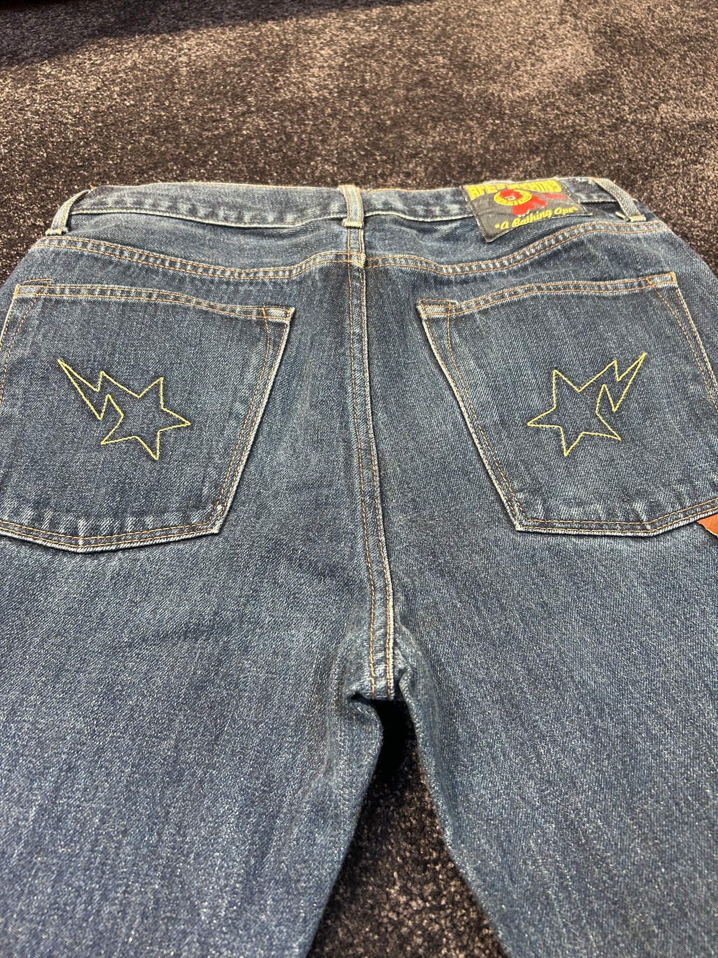 A Bathing Ape Embroidered Back Stars Jeans