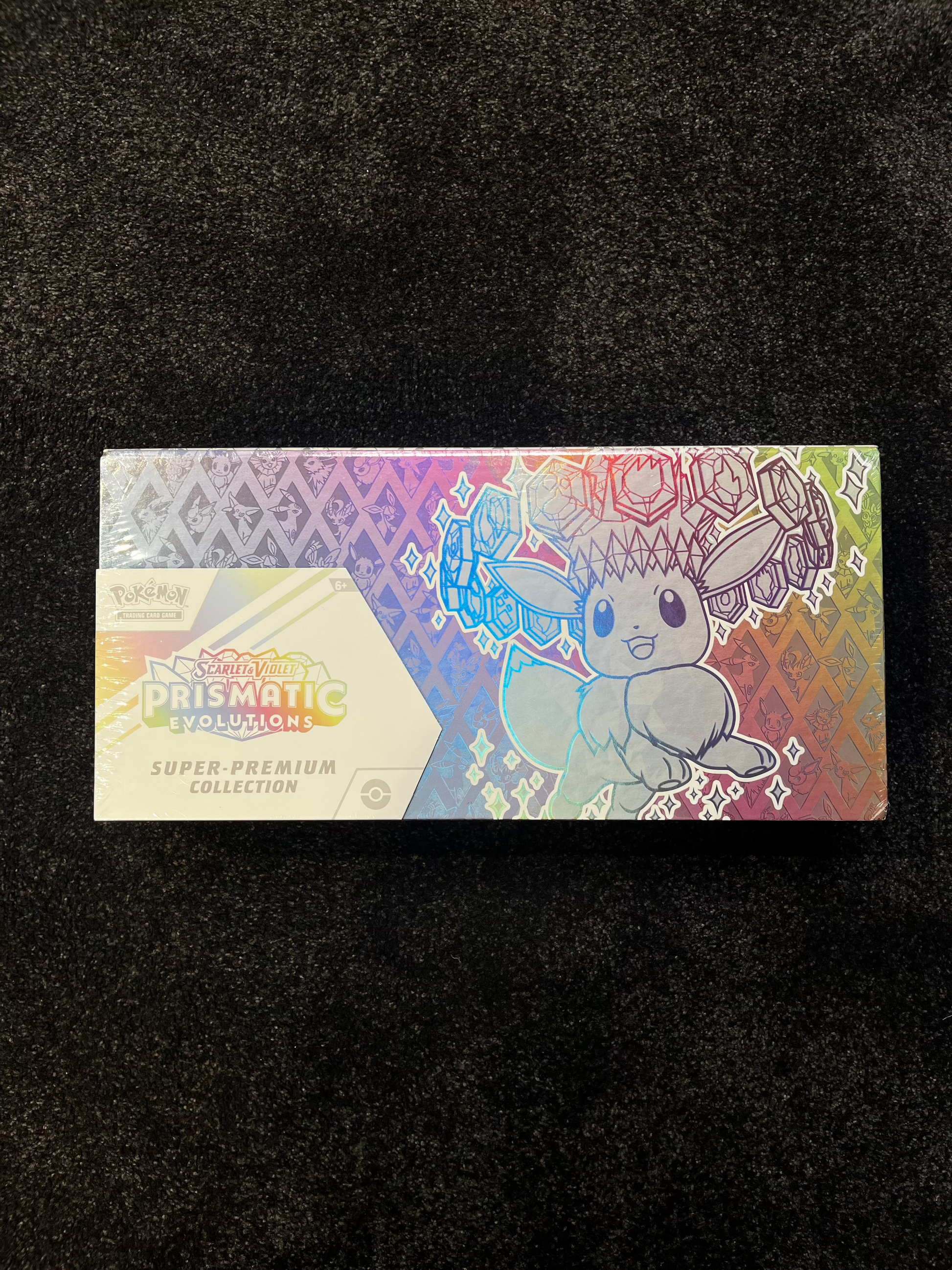 pokemon trading card games prismatic evolutions super premium Pokémon Prismatic Evolutions Super Premium Collection